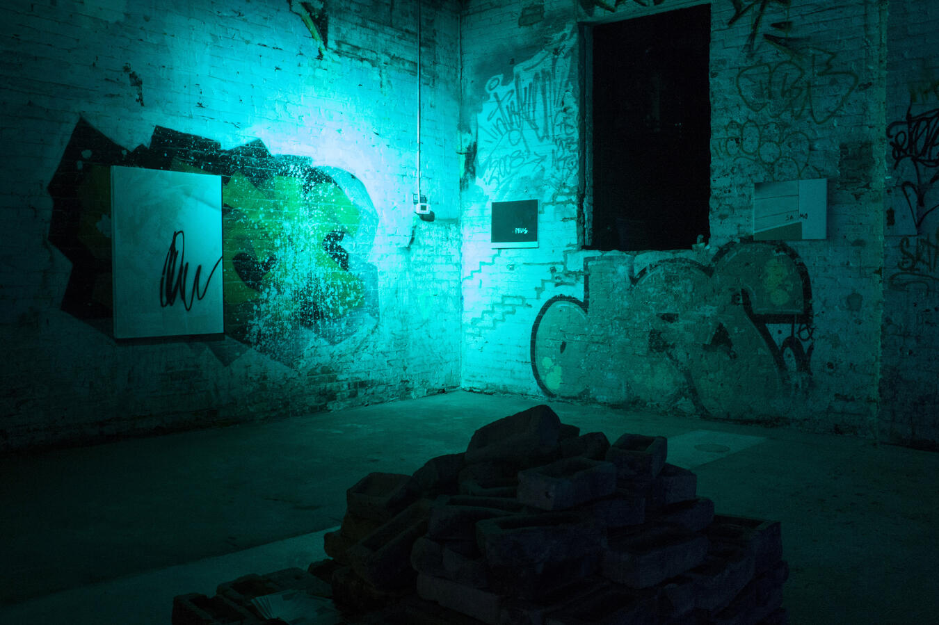 Left to right: "Pink" Aerosol paint, gesso, and oil on canvas. 42 x 30 inches. 2014, "PEVIS" Oil and acrylic on canvas. 20 x 16 inches. 2014, "SAMO" Oil on canvas. 20 x 16 inches. 2014.